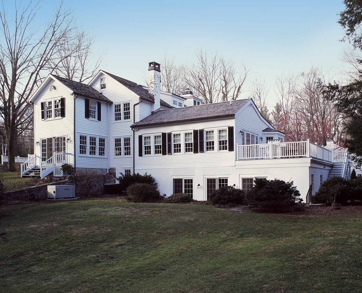 New Canaan 1850s home has indoor pool filled in and converted to living space.